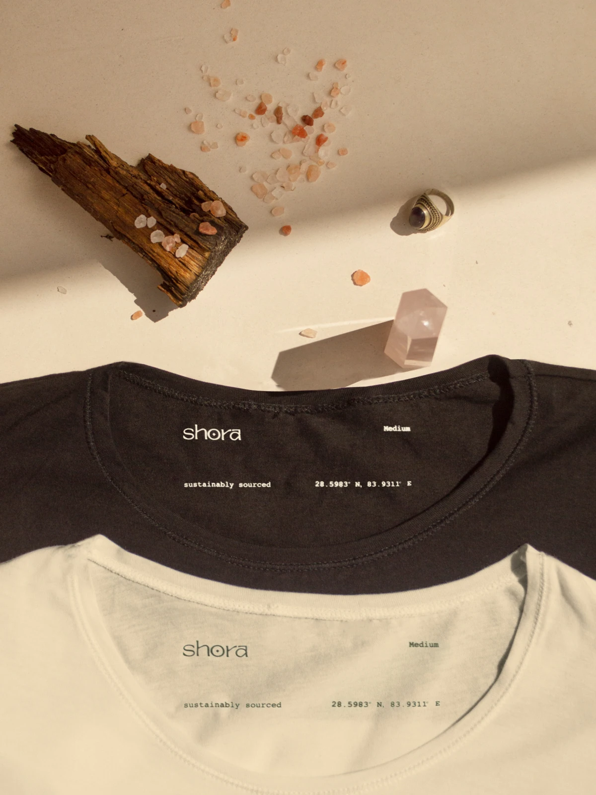 Shora organic T-shirts in black and cream with natural textures