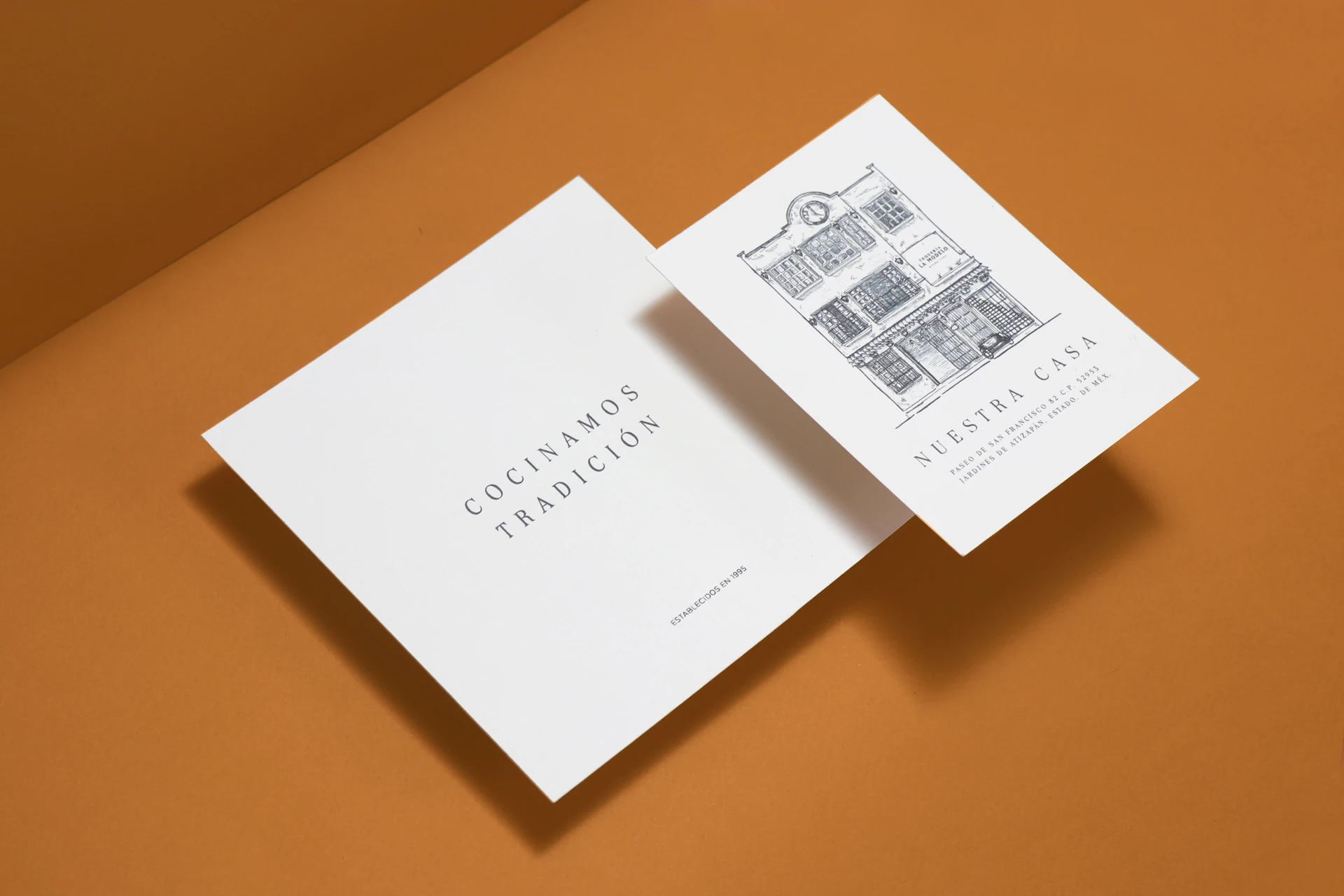 Tarjetas “Cocinamos tradición” de Taquería La Modelo con ilustración del edificio
