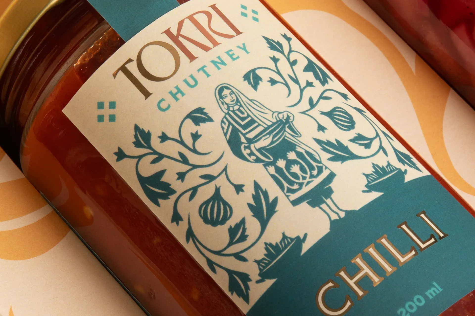 Close-up of the Tokri chilli chutney label illustration